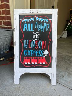 a chalkboard sign that says all aboard the benson express