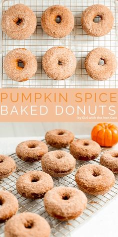 pumpkin spice baked doughnuts on a cooling rack with an orange pumpkin in the background