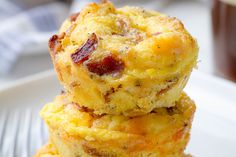 three breakfast muffins stacked on top of each other