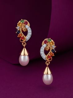 The pair of Navaratna Peacock earrings from Sunny Diamonds are the perfect example. It invokes good fortune with nine precious gems, including Internally Flawless diamonds, in a stunning new avatar. The 18K yellow gold provides the perfect foil for the brilliance it sports too.Appealing to both the new and old, these earrings can easily fit into a trousseau as they can find their sport on a bold corporate ensemble. Peacock Earrings Indian Gold, New Avatar, Neck Pieces Jewelry, Crystal Bead Jewelry, Gold Earrings Models