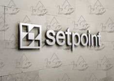 the logo for e2 setpoint is displayed on a wall