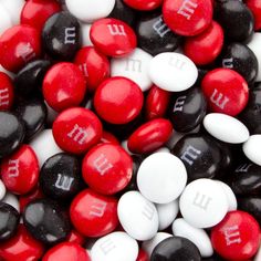 red, white and black m & m's with the letter m on them