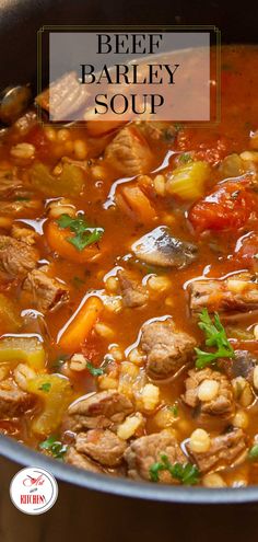 beef barley soup with carrots and potatoes in a pot