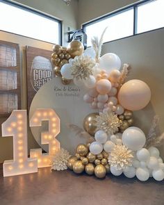 balloons and lights are arranged in the shape of numbers