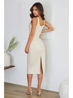 Elevate your evening with this timeless cocktail midi dress made up of nice PU leather fabric. * PU leather fabric. * Midi below the knee length. * Solid color. * Back middle slit. * Back zipper closure. 65% Polyurethane, 30% rayon, 5% polyester. Made in Italy. Mistakes Happen, Cocktail Midi Dress, Midi Cocktail Dress, Good Stretches, Leather Fabric, Dress Making, The Knee, Final Sale, Knee Length