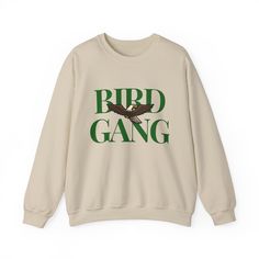 Go Birds This heavy blend crewneck sweatshirt is a must for this season. Wear this sweatshirt to the next game, whether you're catching the game at the Linc, Xfinity Live, or at home, show your love for the underdogs of the game. Our comfortable sweatshirt featuring the loved chant is sure to start the crowd screaming. This sweatshirt makes a great gift for you, your family, a friend, your boss, a co-worker, and everyone!!  Ideal for any situation, a unisex heavy blend crewneck sweatshirt is pure comfort. These garments are made from polyester and cotton. This combination helps designs come out looking fresh and beautiful. The collar is ribbed knit, so it retains its shape even after washing. There are no itchy side seams on these sweaters.  🌟 Extremely soft, light-weight, & comfortable ? Band Merch Long Sleeve Letter Print Sweatshirt, Band Merch Crew Neck Sweatshirt For Winter, Winter Band Merch Crew Neck Sweatshirt, Band Merch Cotton Sweatshirt With Slogan, Cotton Band Merch Sweatshirt With Slogan, Band Merch Sweatshirt With Slogan, Slogan Crew Sweater For Streetwear, Crew Neck Slogan Sweater For Streetwear, Crew Neck Sweatshirt With Letter Print