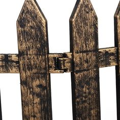 an old wooden fence is shown against a white background