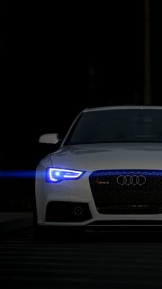 an audi car is shown in the dark