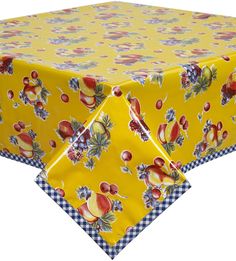 a yellow table cloth with apples on it and checkered blue trim around the edge