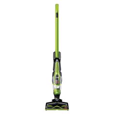 a green and black vacuum on a white background