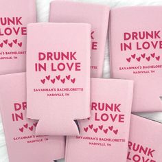 six pink coasters with the words drunk in love printed on them