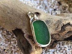 Beautiful and thick piece of Kelly green sea glass found on Kauai, Hawaii in a bold bezel design. Green Glass Pendant Jewelry, Handmade Green Recycled Glass Jewelry, Recycled Glass Green Jewelry For Beach, Green Recycled Glass Jewelry For The Beach, Green Recycled Glass Beach Jewelry, Handmade Green Jewelry From Recycled Glass, Green Recycled Glass Pendant Jewelry, Hawaii Sea, Sea Glass Earrings