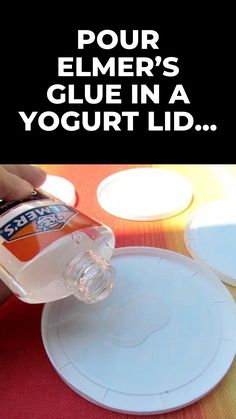 a person pours yogurt into a plastic container on a table with plates