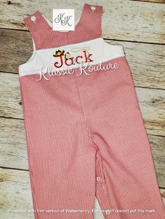 Priority mail does not rush your order. This adorable shortall/longall/bubble has an inset with child's name in a cowboy theme.  It would make the perfect outfit for a western themed birthday party or for that little guy's first rodeo!  Garment is done in red imperial gingham check however it can be customized to your liking.  Please message me with your special request.   Item is fully lined, buttons at the shoulders and snaps at the crotch for easy diapering. Sizes 3T and 4T do not have snaps Western Themed Birthday Party, Rodeo First Birthday, First Rodeo, Cowboy Theme, Jon Jon, Cowgirl Birthday, Cowboy Birthday, Western Cowboy Hats, Birthday Dress