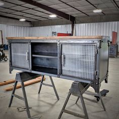 a large metal cabinet sitting inside of a warehouse