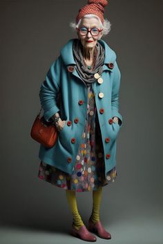 an older woman in a blue coat and polka dot dress is holding a red purse