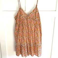 Cute Babydoll Dress With Floral Pattern! Very Light And Flowy! Never Worn. Yellow Ditsy Floral Print Beach Dress, Cute Yellow Spaghetti Strap Dress, Yellow Ditsy Floral Beach Dress, Cute Yellow Dress With Spaghetti Straps, Cute Yellow Dresses With Spaghetti Straps, Cute Cotton V-neck Sundress, Yellow Ditsy Floral Print Dress For Vacation, Yellow Ditsy Floral Print Sundress, Yellow Ditsy Floral Sundress