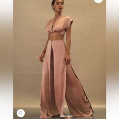 Cut From Lustrous Satin, The Hami Pants Are Overlaid With Draped Skirt Panels That Flow From The High-Rise Waistline To Full, Flared Hems. Style With The Matching Hami Crop Top In Pearl Pink Both Pieces Are Size Xs. Selling As A Set Pearl Pink Color, Andrea Iyamah, Crop Top Lehenga, Flowy Crop Top, Drape Pants, Draped Skirt, Pearl Pink, High Waist Pants, Waist Pants