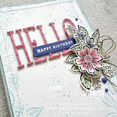 a card with the word hello written in pink and blue on it's side