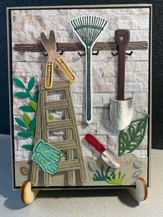 a card with some gardening related items on it