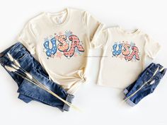 "Matching Mommy and Me July 4th Outfit, Cute USA Shirt, Mama and Me Shirts, Matching Family Shirts, Mom Dad Son Daughter, Fourth of July Our Matching USA Mama and Mini shirts make the perfect addition to you and your little one's wardrobe! Also makes a great gift for any girl mom you know! Please read the details below for sizing info. If you have any questions feel free to reach out and I will be happy to assist you. PLEASE NOTE: These shirts are not sold as a set. You have to order each shirt Mama And Me Shirts, Mini Shirts, Matching Family Shirts, Outfit Retro, Fourth Of July Shirts, Patriotic Shirt, 4th Of July Outfits, Dad Son, Usa Shirt