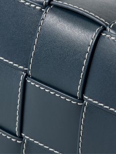 Bottega Veneta's messenger bag has been crafted in Italy using the brand's signature intrecciato weave. It's made from 'Deep Blue' leather and features contrasting topstitching throughout. Store your phone in the zipped pocket inside. Elegant Blue Woven Leather Shoulder Bag, Designer Blue Shoulder Bag With Braided Handles, Designer Blue Shoulder Bag With Woven Leather, Designer Blue Woven Leather Shoulder Bag, Blue Leather Shoulder Bag With Woven Detail, Designer Travel Shoulder Bag With Interwoven Design, Bottega Veneta Intrecciato Bag, Porter Bag, Messenger Bag For Men