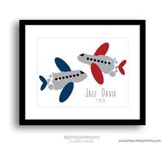 a white frame with a blue and green airplane on it