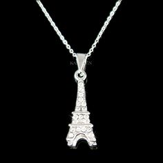 "Want a personalized gift? -Add a Swarovski Crystal Birthstone charm here: https://www.etsy.com/listing/577441131 PERFECT FRANCE TRAVEL SOUVENIR GIFT / WEDDING GIFT FOR LADIES /BRIDE/BRIDESMAID !! You are getting a dainty 3D Eiffel Tower necklace made with Swarovski Crystals. It comes with a FREE 15.5\" original rhodium plated fine cable chain necklace with lobster clasp plus 2\" extender chain. The charm measure 3/8\" wide X 1 1/4\" high (10mm X 31mm). Crystal Color: Crystal Clear Prices are in Elegant Silver Jewelry As Souvenir, Elegant Silver Jewelry For Souvenir, Personalized Silver Necklace For Souvenir, 3d Eiffel Tower, France Honeymoon, Eiffel Tower Necklace, Christmas Gift Items, Travel Souvenirs, Holiday Vacation