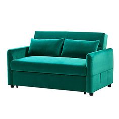 a green couch sitting on top of a white floor