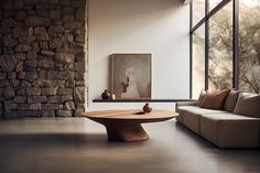 a modern living room with stone walls and floor to ceiling windows overlooking the landscape outside