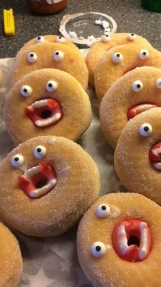 there are many donuts with googly eyes on them