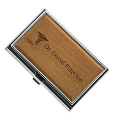 a wooden business card holder with the name mark green on it