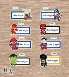 avengers and spiderman stickers on a wooden surface with the names of their respective characters