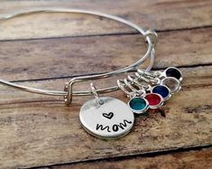 Personalized Infinity Bracelet Family Gift for Mom Family | Etsy Customizable Stainless Steel Jewelry For Mother's Day, Personalized Stainless Steel Dangle Jewelry, Silver Dangle Jewelry With Custom Name, Personalized Sterling Silver Charm Bracelet For Mother's Day, Personalized Adjustable Dangle Jewelry, Personalized Jewelry For Everyday Wear, Personalized Silver Charm Bracelet With Birthstone, Personalized Adjustable Everyday Jewelry, Mother's Day Personalized Sterling Silver Charm Bracelet