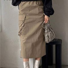 Hey Guys! I’m Selling This Brand-New Skirt Of Mine. Fit To S-M Color: Khaki Never Worn $20 Brandnew Like Brand New With Tag Good Skirt And Fitted No Damage At All Perfect For All The (4) Seasons Grab This Onw Now! Add To Cart! Casual Khaki Midi Skirt, Casual Khaki Cargo Skirt For Spring, Casual Khaki Skirt With Side Pockets, Casual Khaki Skirt With Pockets, Casual Beige Cargo Skirt For Work, Brown Cargo Skirt With Pockets For Spring, Casual Skirt, Flap Pocket, Womens Skirt