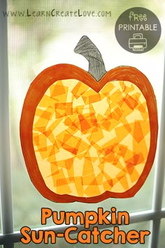 a pumpkin sun catcher made out of paper and cut into pieces with the words pumpkin sun catcher on it