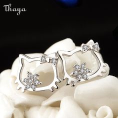 Creative Kitty Cat Earrings appeal to individuals who love cats and appreciate whimsical and unique accessories. These earrings likely offer wearers a fun and stylish way to showcase their love for feline companions through a creative and artistic interpretation of cat imagery in jewelry.  - Brand: Thaya  - Material: 925 Silver  - Size: 11*9mm  - Weight: 1.2g  - Style: Cat  - Gender: Women's Cat Gender, Unique Accessories, Cat Earrings, Jewelry Brand, Kitty Cat, Ear Studs, Accessories Unique, Cat Ears, Jewelry Care