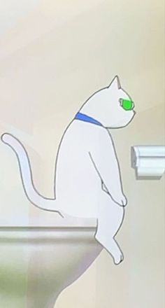 a white cat sitting on the edge of a toilet