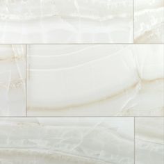 an image of white marble tiles that look like they have been painted