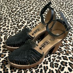 A Handmade Pair Of 100% Leather High Heel Wedges Featuring A Mexican Huarache Design! Size 8 But Can Fit A 8 1/2. Made With Premium Rubber Soles. Inner Sole Is Lined With Authentic Leather. 2 1/2 Block Heel For A Stylish Look! New And Never Worn, The Leather Will Mold To Your Feet. Fits A Size 8 Or 8 1/2 Shoe Size 2 1/2 Block Heel Perfect For A Huarache Fan! ***Check Out My Closet For Other Shoes And Clothing Items*** Black Leather Closed Toe Wedge Sandals, Black Platform Sandals With Low Heel, Black Sandals With Wooden Low Heel, Black Closed Toe Wedge Sandals Medium Width, Black Synthetic Wedge Sandals With Wooden Heel, Black Low Heel Wedge Sandals With Heel Strap, Black Leather Low Heel Wedge Sandals, Black Huarache Sandals With Removable Insole And Round Toe, Black Low Heel Wedge Sandals With Removable Insole