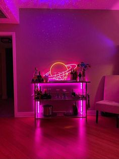 a purple room with neon lights and furniture