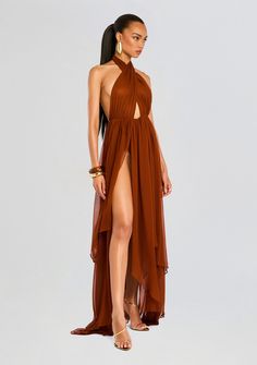 Radiate confidence with our Ina Silk Chiffon Dress. This neutral, flowy masterpiece features a crossover-neck design, mini center cutout, and daring thigh-high slits that will have heads turning. Shown here in Caramel. 100% Silk Made in China Model is 5'10" wearing size S Style No. SS23-6520 Long Brown Dress, Boho Evening Dress, Bridal Reception Dress, Cutout Gown, Bride Bachelorette, Radiate Confidence, Bachelorette Party Bride, Silk Chiffon Dress, Rehearsal Dress