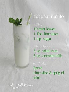 coconut mojito recipe in a tall glass with mint garnish on top