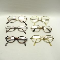 Vintage LOT of 6  Eyeglasses, 1980s, 90s Foster Grant, Lady Eyelon, LeLunelle, Readers, Childs, Wire Rims, All Prescription...sold As- Is This is a Vintage LOT of 6  Eyeglasses.  Guestimated to be from the 1980s or 90s, the lots includes;  Foster Grant, Lady Eyelon, LeLunelle and Readers.  there is also a very small pair of child's glasses. They all appear to be prescription and are in used condition.   See ALL photos...ask questions, sold...as-is.  I have tried to describe this I have tried to describe this lot of  Eyeglasses, as accurately as possible. I am by NO means an expert, therefore I may not know what to describe, or what imperfections to note. If you have questions, do not hesitate to message me.  💓 BACK to retrogal415 HOME PAGE: https://www.etsy.com/shop/retrogal415?ref=seller Vintage Glasses Aesthetic, Glasses Vintage, Aesthetic Glasses Frames Vintage, Fashion Glasses, Y2k Eyeglasses, 90s Eyeglasses, 2000s Glasses Frames, 90s Reading Glasses, Wire Frame Glasses