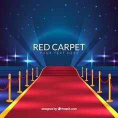 a red carpet with ropes and poles on it