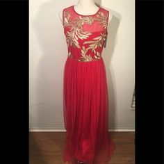 Stunning Red Formal Gown With Intricate Gold Embroidery & Sequins Overlaying A Mesh Material!! Whole Dress Has A Mesh Top Coat With Full Lining Underneath -16.5 Inches From Armpit To Armpit, 52 Inches In Length -Loops On Each Side Of Dress At Waist To Accessorize A Beautiful Belt Over The Dress 100% Polyester, Dress Pulls Over Head, No Closure Festive Sleeveless Spring Gown, Festive Red Sequin Gown, Gold Sleeveless Gown For Festive Occasions, Embellished Red Maxi Dress, Sleeveless Evening Dress For Christmas, Festive Floor-length Evening Dress For Holidays, Festive Floor-length Embroidered Evening Dress, Embroidered Floor-length Maxi Dress For Prom, Red Embroidered Floor-length Maxi Dress