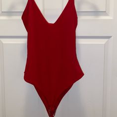 Red, Size 8, Pretty Little Thing Plunge Body Suit, Nwt Red Fitted V-neck Bodysuit, Fitted Red V-neck Bodysuit, Red V-neck Bodysuit For Spring, Spring Red V-neck Bodysuit, Chic Red Bodysuit For Summer, Red Lined Backless Bodysuit, Red Backless Lined Bodysuit, Red Backless Bodysuit With Lined Body, Red Sleeveless Swimwear For Party