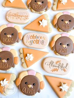 decorated cookies are arranged in the shape of turkeys and pies with names on them