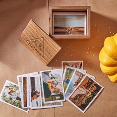 there are many pictures on the table next to each other