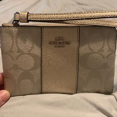 Bnwb Never Used, Platinum/ Gold Color. Super Cute And Authentic. Coach Gold Rectangular Wristlet, Gold Rectangular Coach Wristlet, Coach Gold Clutch Wristlet, Gold Coach Clutch Wristlet, Coach Gold Wristlet For Everyday Use, Gold Coach Wristlet For Everyday, Coach Mini Purse, Mini Hand Bag, Coach Leather Bag